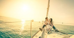 a couple enjoys their time on a boat