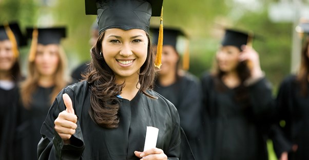 a young woman graduates from a social work program