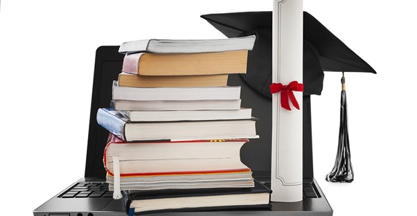 textbooks and a diploma symbolize the concepts certified and accredited