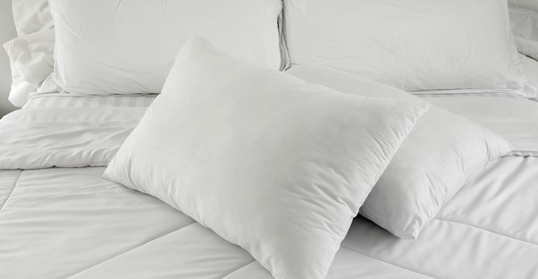 crisp and clean white bed linens