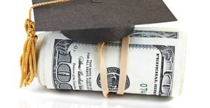a graduation cap and $100 bill